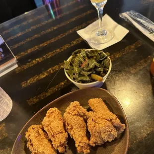 Chicken wings, greens, pineapple mimosa