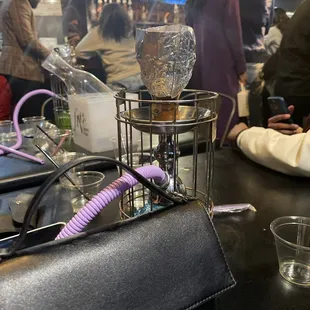 a woman sitting at a bar