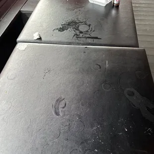 The table we sat at that nobody came and cleaned for 2 hours! None of this is ours.
