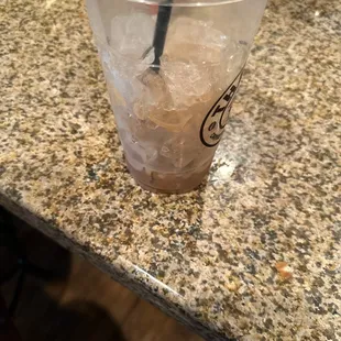 a drink in a plastic cup