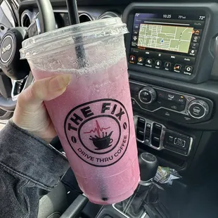 Pink lotus with cherry flavor and coconut milk topper with the fusion fix
