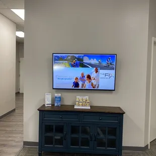 New office space, and I love the scrolling information on the TV.