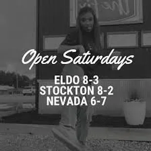 a woman standing in front of a building