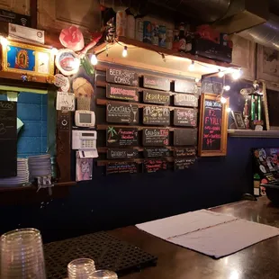  bar with a menu on the wall