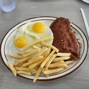 Eggs corn beef hash french fries