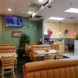 Seating area. They got the big tvs here