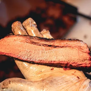 a person holding a knife in their hand