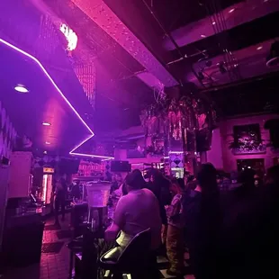 a crowd of people sitting at tables