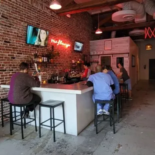 people sitting at a bar