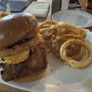 The Pimento Chick - Fried chicken breast, pimento cheese, onion rings, bbq sauce, brioche bun.