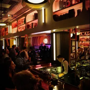 people sitting at the bar