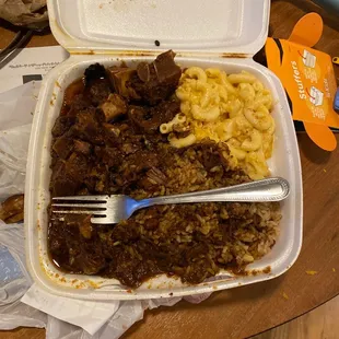 a meal in a styrofoam container