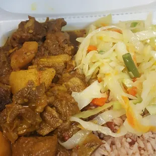 Curry Goat with rice &amp; peas and steamed cabbage