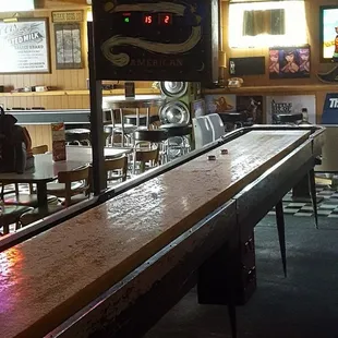 Full-sized shuffleboard table.