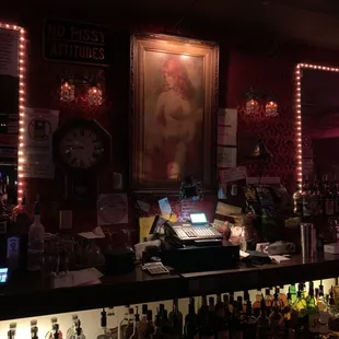 a bar with many bottles of alcohol