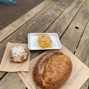 Chocolate Almond Croissant, Egg and Cheese Sandwich and Sourdough Bread