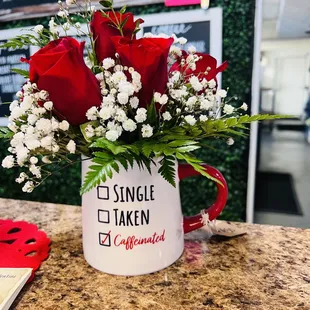 red roses in a mug