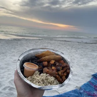 Build your own bowl with rice, sweet potatoes, beans, and plantains