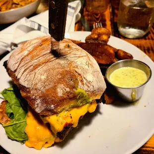 Meatloaf sandwhich w/ pimento - bread nicely toasty/ chewy, meatloaf was tender &amp; had herby flavors, cheese melty, and vibrant condiments!