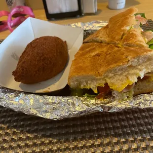a sandwich and a side of bread