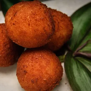 Stuffed Potatoes - Seasoned Ground Beef, Ground Pork and Mashed Potatoes, rolled in seasoned Bread Crumbs and deep fried.