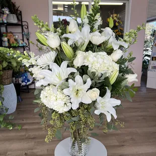 All White Floral Arrangement. (Lilies, hydrangeas, roses &amp; assorted greenery)