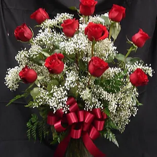 Dozen Red Freedom Roses in a vase