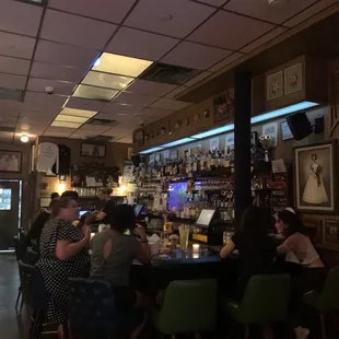 people sitting at the bar