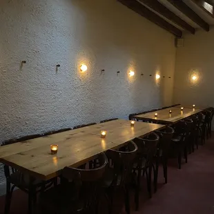 a long table with candles on it