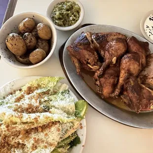 Chicken, Caesar salad and potatoes