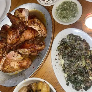 Whole chicken, potatoes, green sauce, white sauce, special Brussel sprouts, green beans