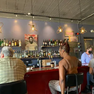 people sitting at a bar