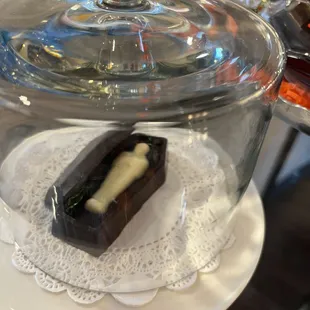Chocolate coffin with white chocolate vampire