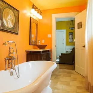 Large classic bathtub is the highlight of the bathroom for The Giovanni Room