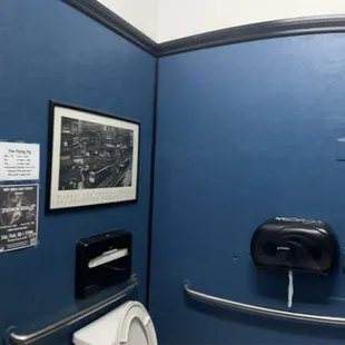 a bathroom with blue walls