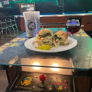 Pair the pesto chicken sammich with playing Mrs. PAC Man. Pretty shweet.