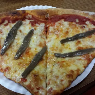 COLD anchovies on my hot pizza slices. guy said it was health code issue on slices and had been 10 yrs. First4me.