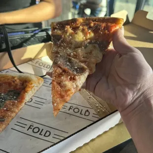 One toping $6.5p slice of pizza.