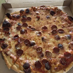 $28.80 for a pepperoni pizza, an extra $1.20 for more pepperoni and it looks like some slices don't even have pepperoni on them.