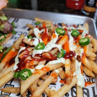 Crazy fries! Yes those are serrano peppers