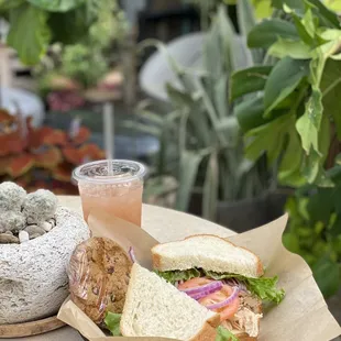 a sandwich and a drink on a table