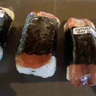 Portuguese sausage with eggs, spam, Nathan hot dog musubi and mini musubis!!! Spam is good but not as thick as most places.