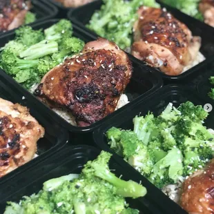 a tray of chicken and broccoli