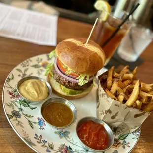Pat Lafrieda Burger with Dijon, spicy house pickle aioli and ketchup!