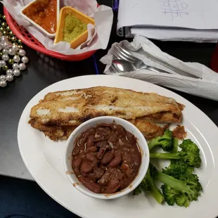 Grilled fish and red beans and rice with broccoli great home cooked meal.