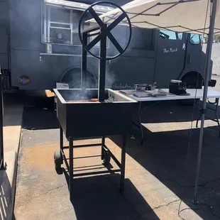 smoke coming out of the grill