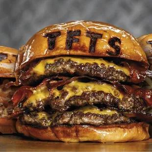 three burgers stacked on top of each other