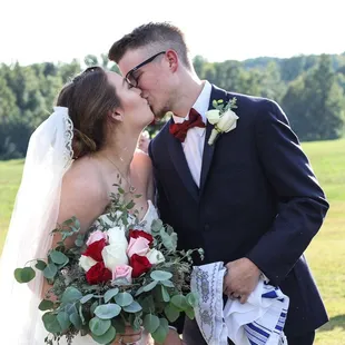 Bouquet was done by Forevermore Florals