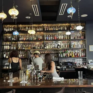 two women behind the bar