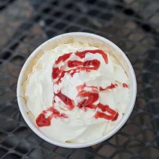 a cup of ice cream on a table